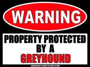 GREYHOUND PROPERTY PROTECTED BY WARNING SIGN